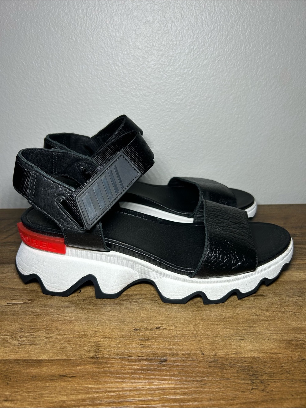Sorel Black and White Sporty Platform Sandals with Red Accent